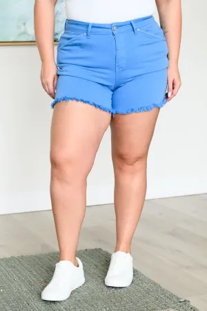 Judy Blue Mid-Rise Shield Pocket Cutoff Shorts in Sky Blue