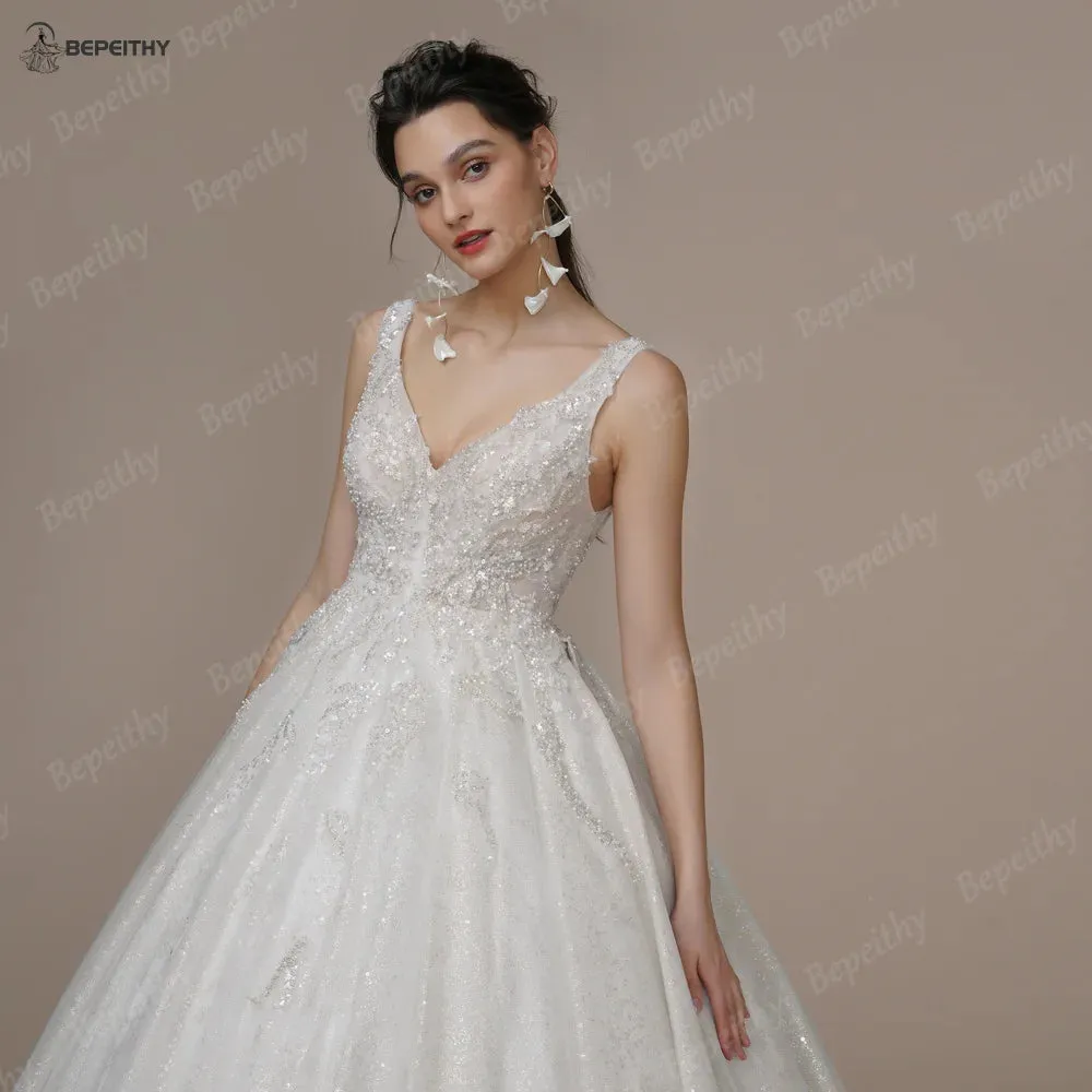 Luxury V Neck Crystal Wedding Dresses Sleeveless Court Train Beading