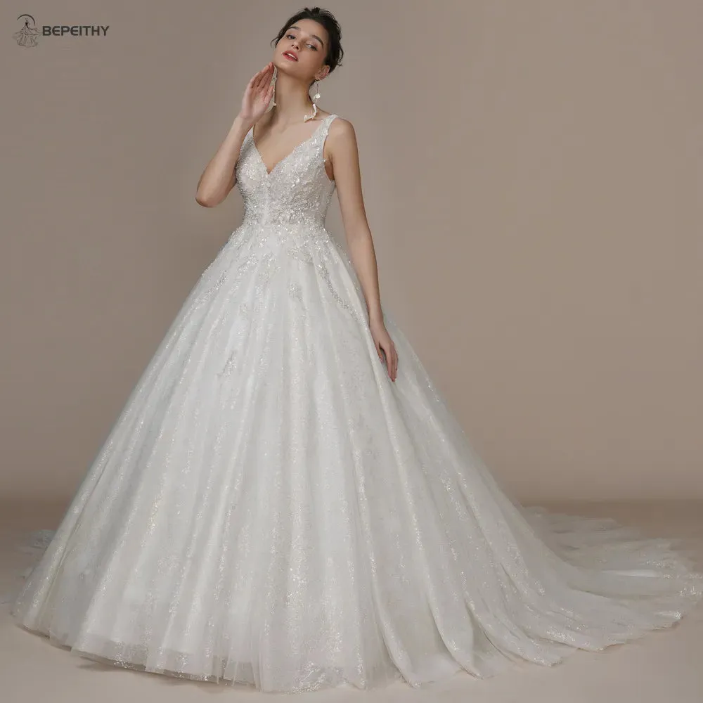 Luxury V Neck Crystal Wedding Dresses Sleeveless Court Train Beading