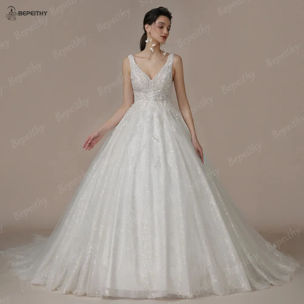 Luxury V Neck Crystal Wedding Dresses Sleeveless Court Train Beading