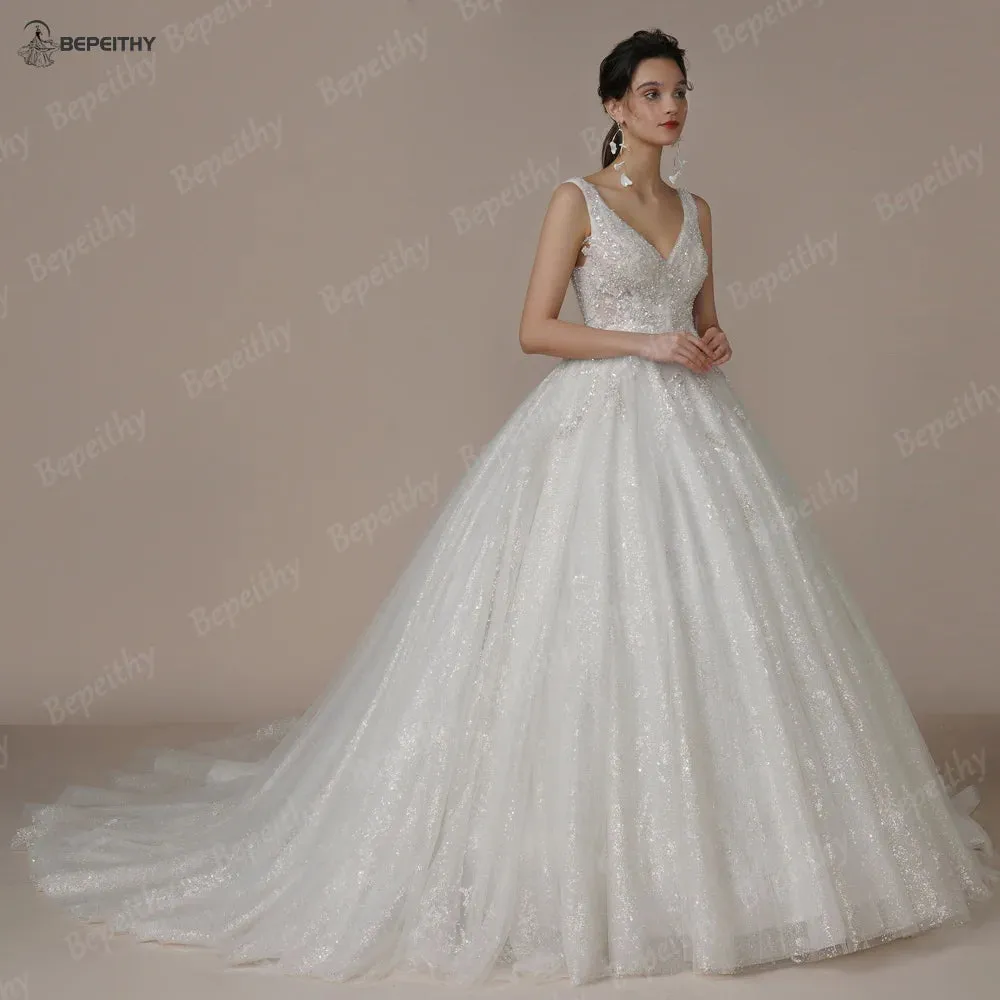 Luxury V Neck Crystal Wedding Dresses Sleeveless Court Train Beading
